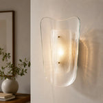 Cargar imagen en el visor de la Galería, Clear glass wall sconce installed in a styled interior