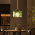 Charger l'image dans la visionneuse de galerie, Olive green ripple glass pendant above a counter