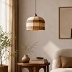 Bild in Gallery-Viewer laden, Walnut cup patchwork pendant light beside a calm living area