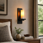 Bild in Gallery-Viewer laden, Black metal wall sconce beside a bedroom nightstand