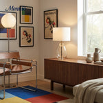 Bild in Gallery-Viewer laden, Sustaina Gebogene Tischlampe aus recyceltem Glas mit Stoffschirm – Nachhaltige moderne Akzentbeleuchtung für Wohnzimmer