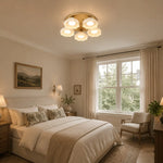 Cargar imagen en el visor de la Galería, Gold and white glass ceiling light in a modern bedroom