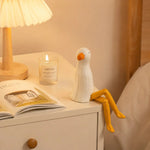 Cargar imagen en el visor de la Galería, Hand-carved wooden seagull ornament styled on a tabletop edge