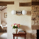 Cargar imagen en el visor de la Galería, Aplique de pared para baño de estilo moderno de mediados de siglo Lumio Globe Opal Glass