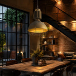 Cargar imagen en el visor de la Galería, Antique brass cage pendant light in a cafe interior
