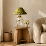 Bild in Gallery-Viewer laden, Floral glass table lamp beside a sofa in a living room