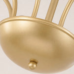 Load image into Gallery viewer, Close-up of the chandelier's satin gold metal finish