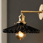 Bild in Gallery-Viewer laden, Close view of black pleated ceramic wall sconce shape