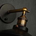 Load image into Gallery viewer, Close-up of round wall plate, metal arm, and adjustable joint