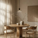 Cargar imagen en el visor de la Galería, Clear brass glass pendant light installed above a round dining table