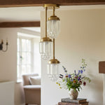 Load image into Gallery viewer, Tierlux Glass Tiered Skyscraper Shade Pendant – Art Deco Ceiling Light for Kitchen Island