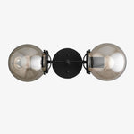 Cargar imagen en el visor de la Galería, Lámpara de tocador de baño moderna de estilo industrial Lumio Globe de cristal transparente