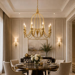 Load image into Gallery viewer, Gold eight-light candle chandelier in an elegant dining room