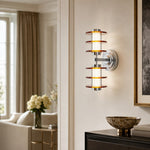 Bild in Gallery-Viewer laden, Vertical amber acrylic chrome wall lamp in an entryway setting