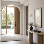 Charger l'image dans la visionneuse de galerie, Chrome wall sconce adding a sculptural accent to an entryway