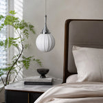 Bild in Gallery-Viewer laden, Ribbed glass pendant styled beside a bed