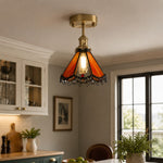 Bild in Gallery-Viewer laden, Orange stained glass ceiling light in an entry console scene