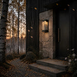 Cargar imagen en el visor de la Galería, Matte black outdoor wall light beside a modern entry door