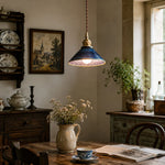 Bild in Gallery-Viewer laden, Blue ceramic pendant light installed over a rustic dining table