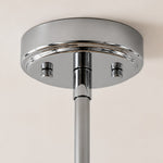 Bild in Gallery-Viewer laden, Close view of the polished metal ceiling canopy and downrod