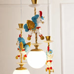 Bild in Gallery-Viewer laden, Close up of blue unicorn ornament beside illuminated globe shade