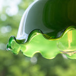 Bild in Gallery-Viewer laden, Lit wavy green glass shade edge detail