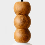 Bild in Gallery-Viewer laden, Close view of three sculpted wood beads with distinctive grain patterns