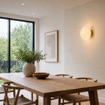 Cargar imagen en el visor de la Galería, Cream ribbed glass wall sconce in a dining room
