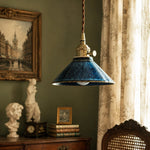 Bild in Gallery-Viewer laden, Blue glazed ceramic pendant light in a classic reading corner