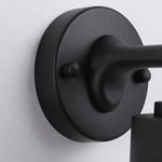 Bild in Gallery-Viewer laden, Close view of the black round wall plate and metal arm