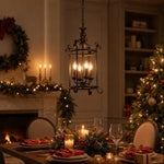 Load image into Gallery viewer, Black iron pendant creating a warm dining atmosphere