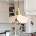 Load image into Gallery viewer, Close kitchen view of a leather petal pendant light