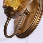 Bild in Gallery-Viewer laden, Sculpted Amber Glass and Brass Wall Sconce