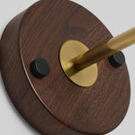 Bild in Gallery-Viewer laden, Wood round base and brass-tone arm detail