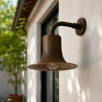 Charger l'image dans la visionneuse de galerie, Antique brass wall sconce installed on an exterior wall in daylight