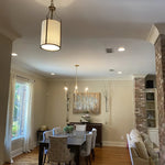 Load image into Gallery viewer, Antique Brass Carousel Chandelier with White Linen Drum Shade for Dining Room