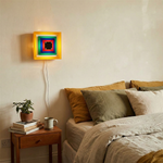 Load image into Gallery viewer, Color-Frame Geometric Plug-In Wall Lamp alternate room view