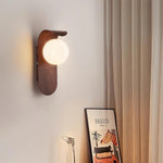 Load image into Gallery viewer, Wood-Tone Globe Plug-In Wall Lamp room scene