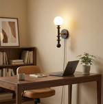 Load image into Gallery viewer, Walnut Stem and Glass Globe Plug-In Wall Lamp room scene 6