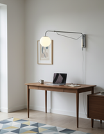 Bild in Gallery-Viewer laden, Chrome Pivot-Arm Globe Plug-In Wall Lamp room scene