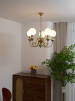 Load image into Gallery viewer, Elegant Chandelier with Curved Arms and Ambient Lighting Ambience