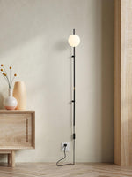 Load image into Gallery viewer, Funiculi Glass Plug-In Wall Light - product image 2