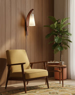 Cargar imagen en el visor de la Galería, Curved walnut and frosted glass plug-in wall lamp in a study