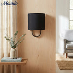 Cargar imagen en el visor de la Galería, Lámpara de pared con pantalla de tela Nolvara: aplique moderno para dormitorio con una iluminación acogedora