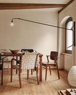 Cargar imagen en el visor de la Galería, Pivoting Long-Arm Black Wall Lamp product view 10