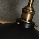 Load image into Gallery viewer, Close-up of antique brass-tone metal lamp holder and black shade