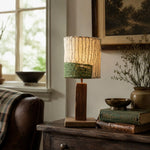 Cargar imagen en el visor de la Galería, Green panel loofah table lamp lit in a warm living room