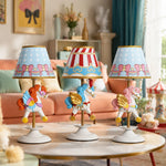 Cargar imagen en el visor de la Galería, Three carousel unicorn table lamp styles in a nursery scene