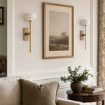 Cargar imagen en el visor de la Galería, Natural brass wall sconces over a sofa side table