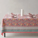 Cargar imagen en el visor de la Galería, Pink garden border floral tablecloth on a dining table